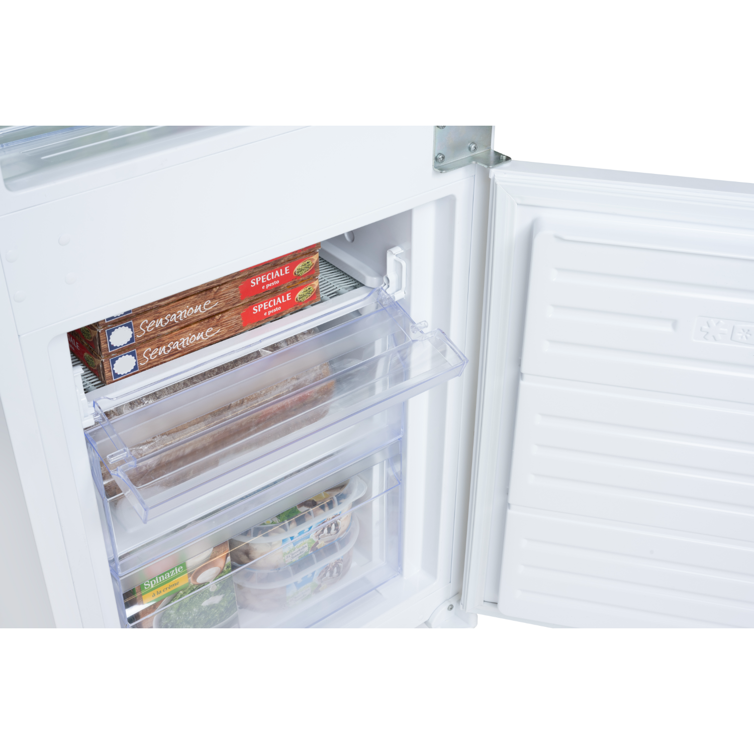 White refrigerator with open door. Interior shows shelves and frozen food.
