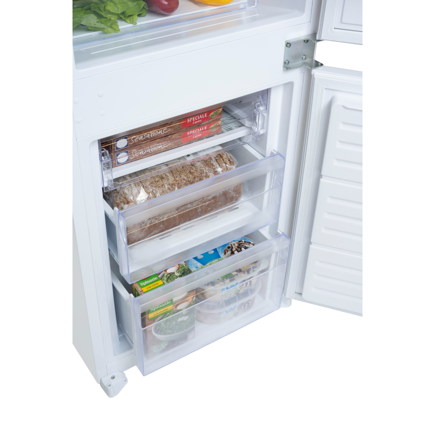 Opened white refrigerator, showing shelves with frozen food.