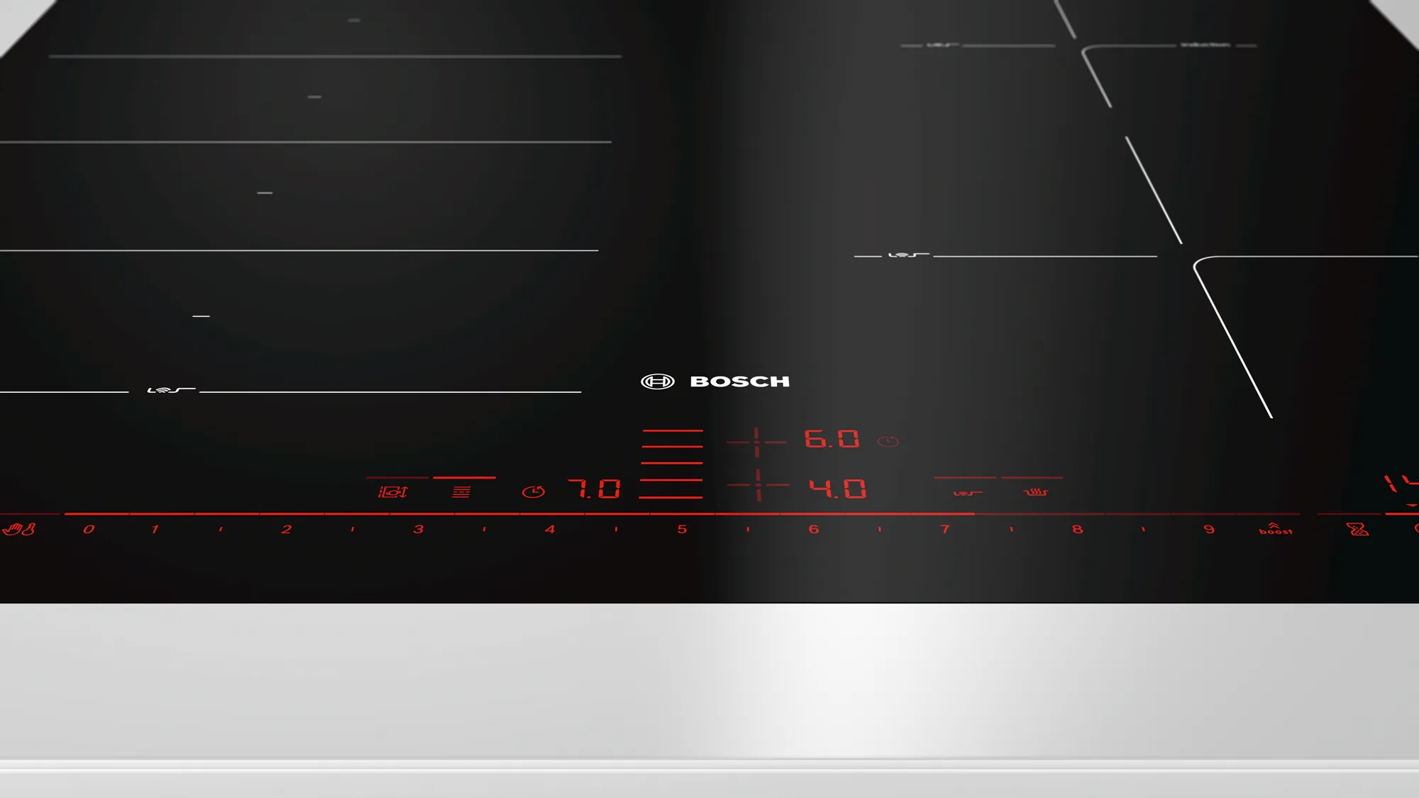 Une table de cuisson à induction noire avec le logo Bosch et des zones de cuisson éclairées.