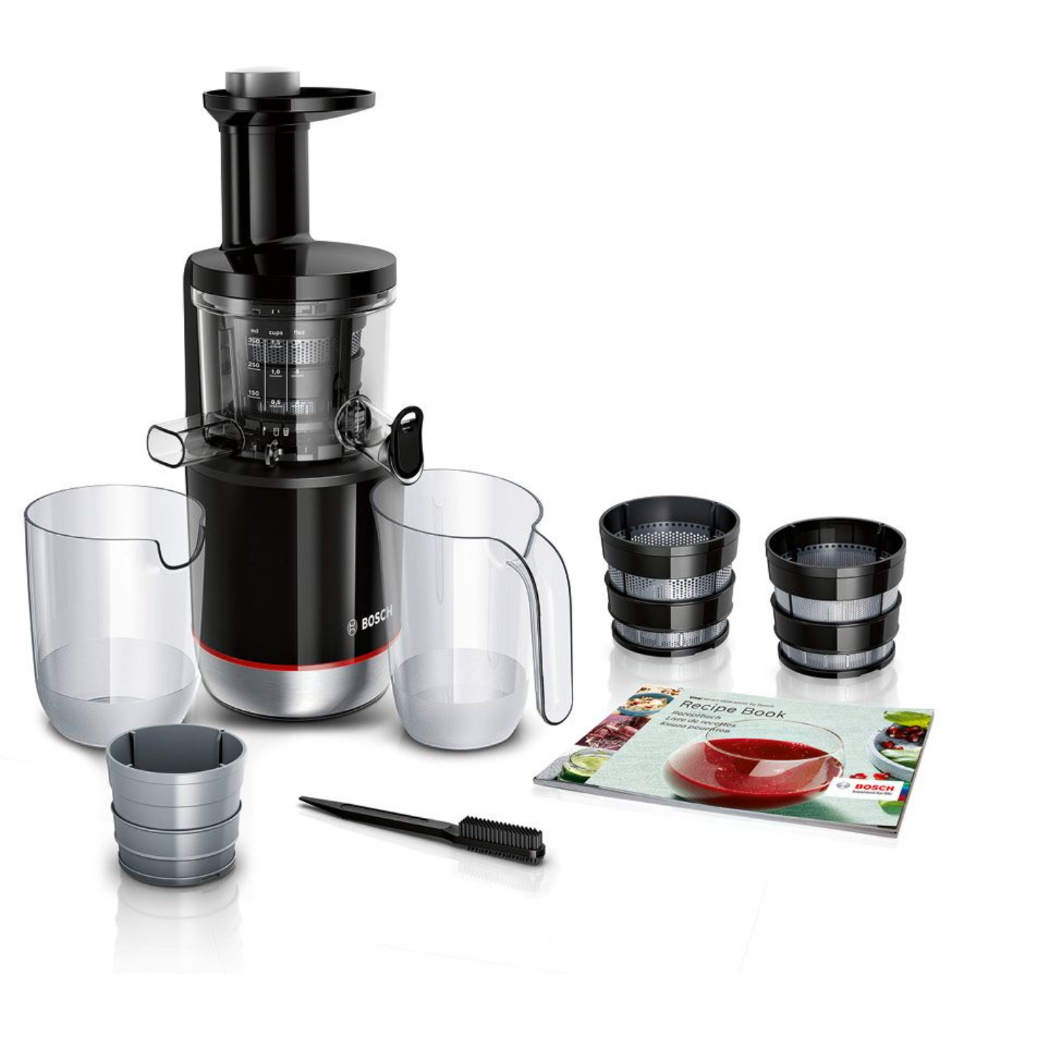 Sapcentrifuge met accessoires, waaronder twee kannen, twee filters en een receptenboek.