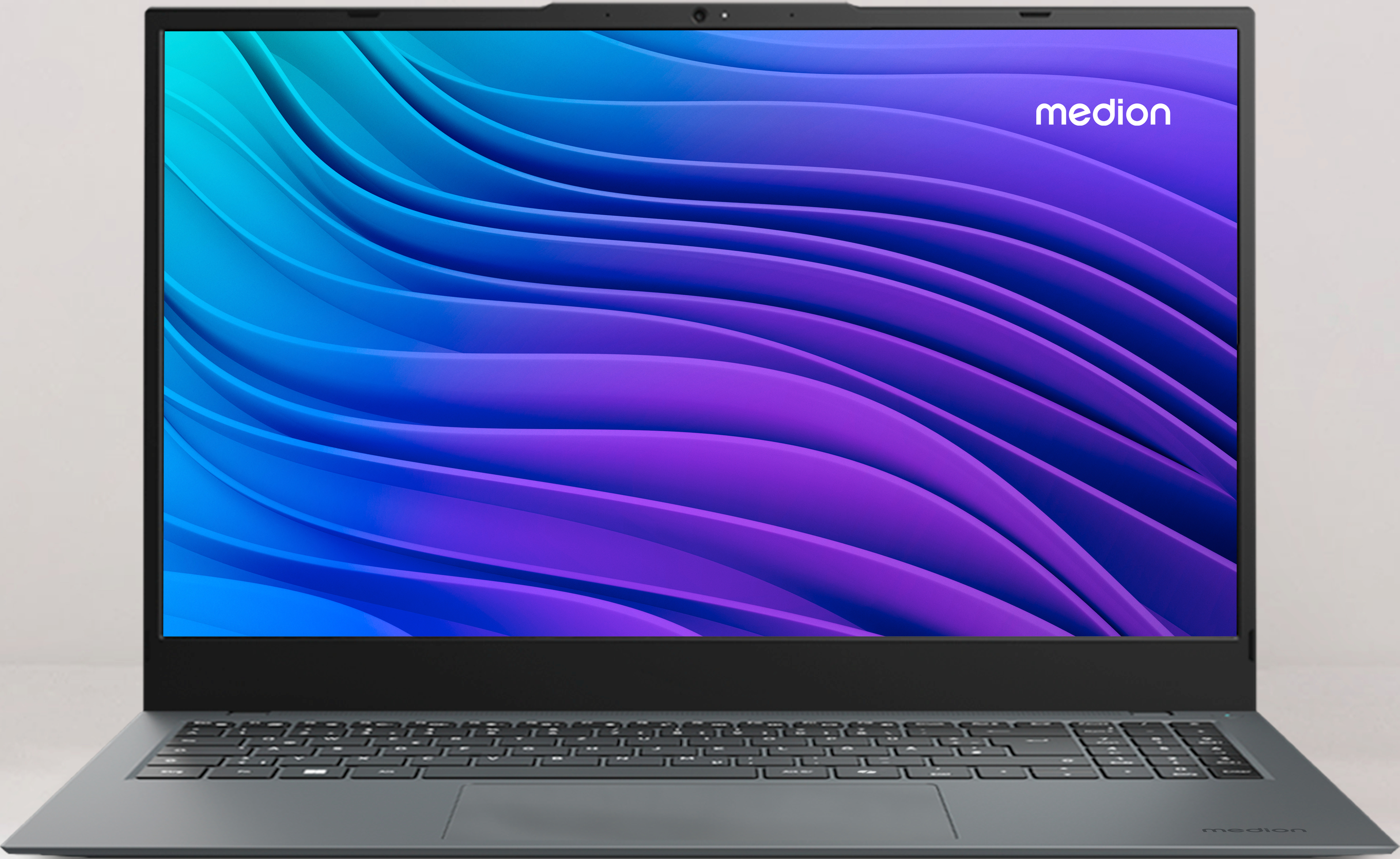 Laptop zeigt abstrakten Hintergrund in Blau, Lila und Türkis. Der Laptop ist schwarz.