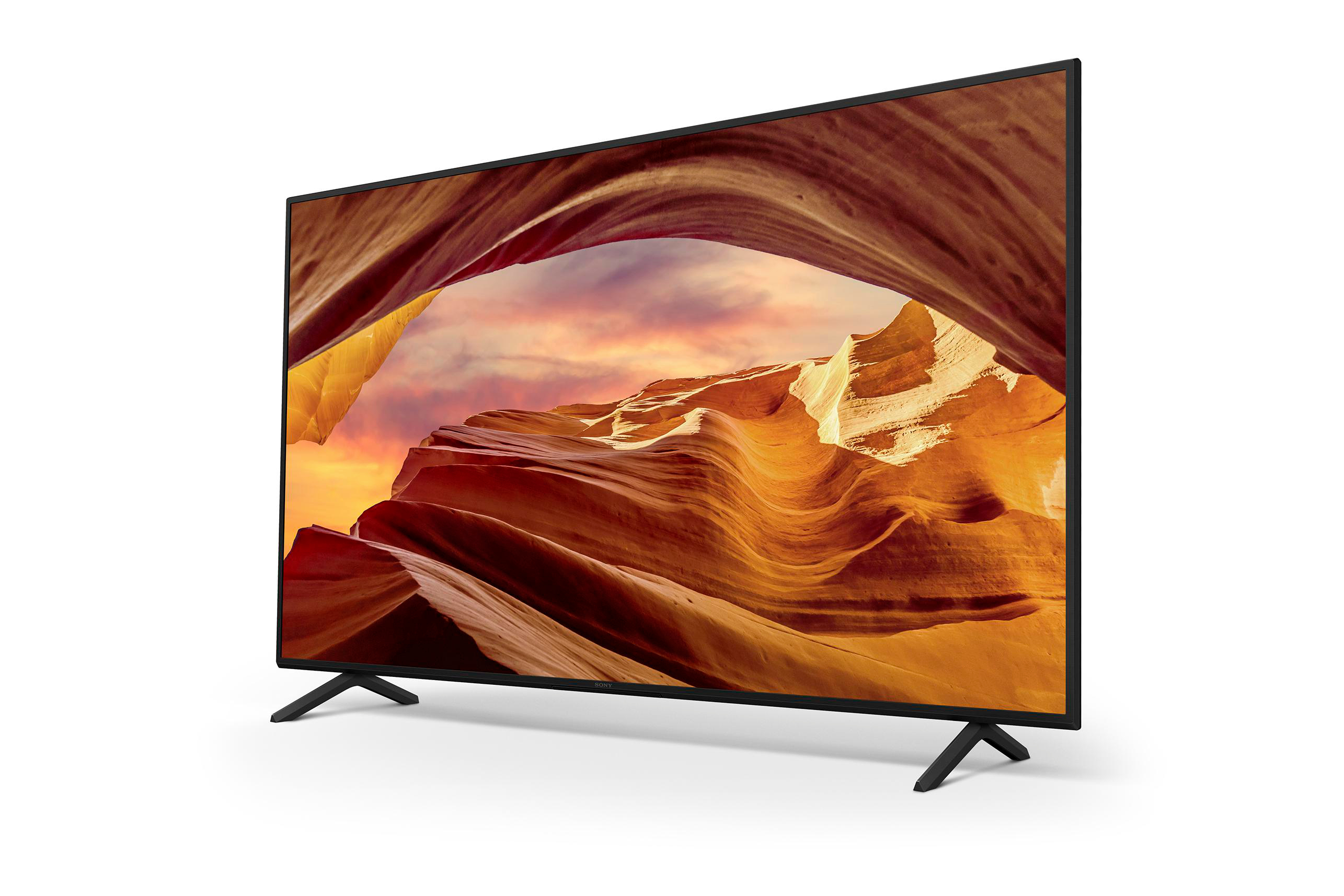 Ein Breitbild-Fernseher mit schwarzem Rahmen, der eine Schluchtszene in warmen Farben zeigt.