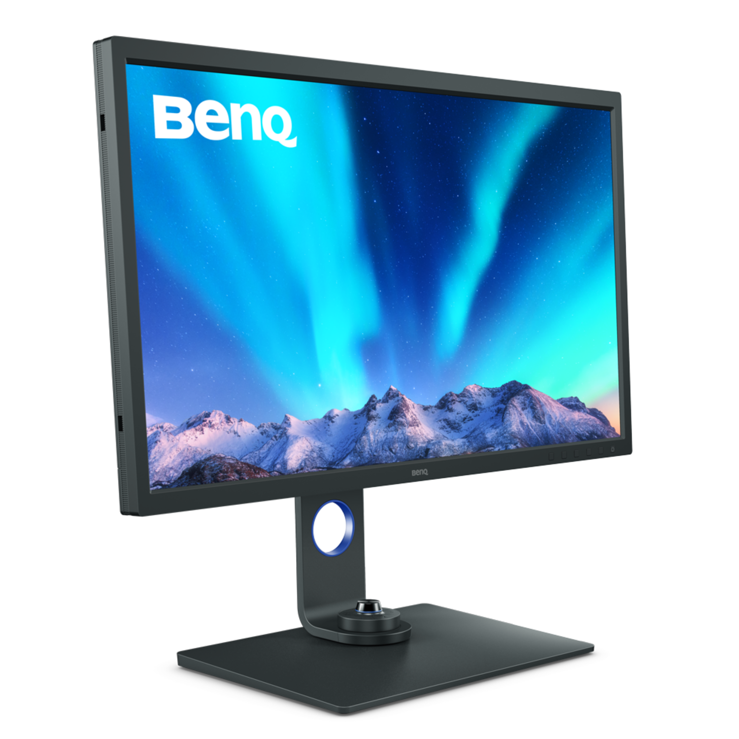 BenQ monitor displaying an aurora borealis scene. The monitor is on a dark surface.