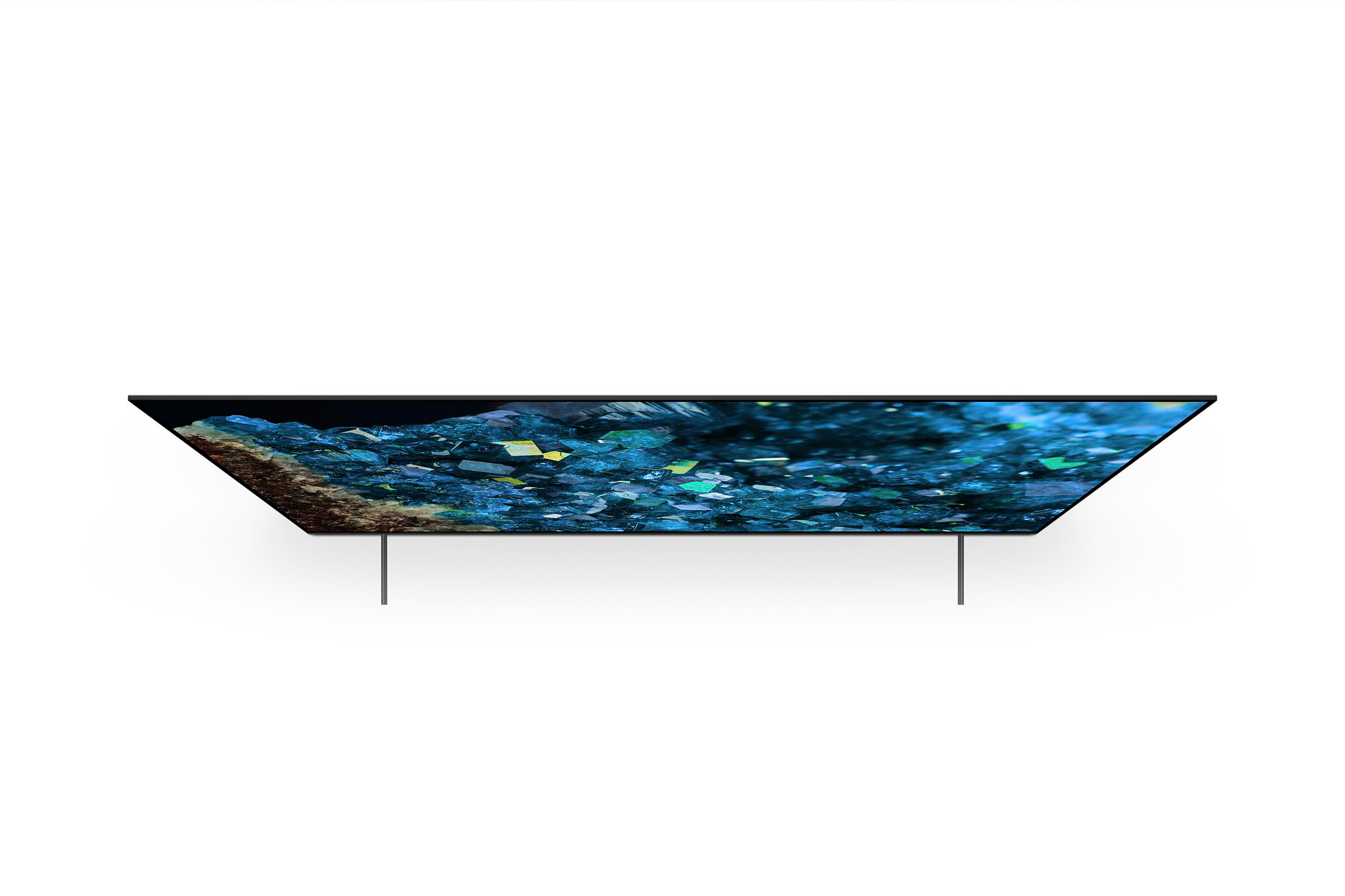 Ein dünner schwarzer Fernseher mit farbenfrohem Bildschirm, Draufsicht.