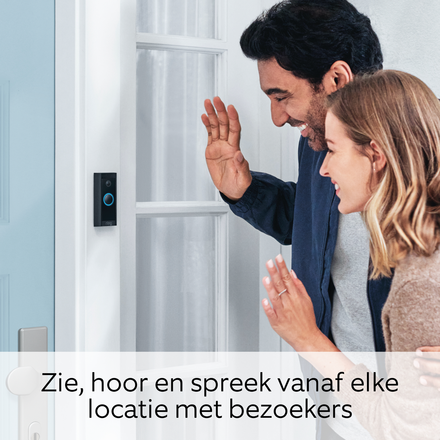 A couple waves near a Ring doorbell. Text reads: See, hear, and speak from any location.