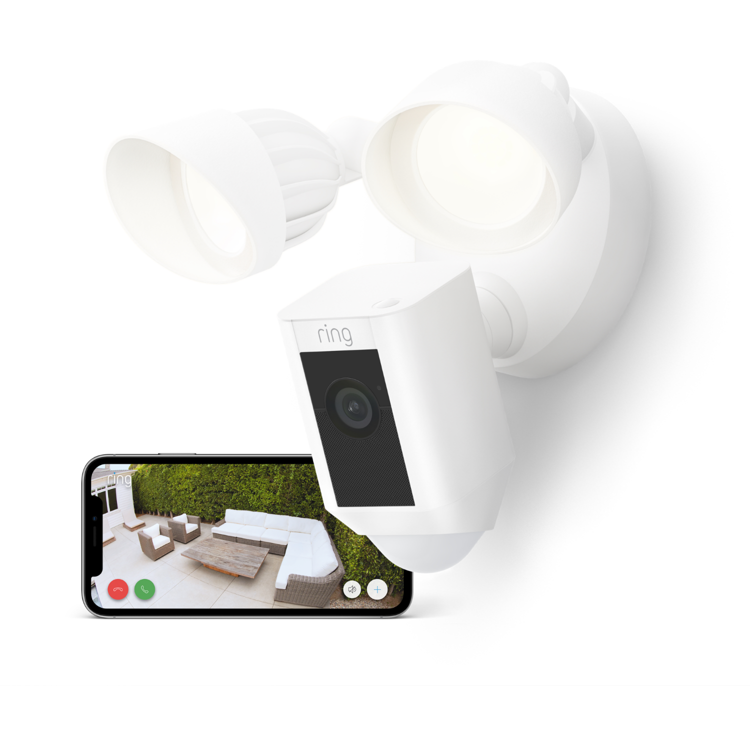 White security camera on a wall. Phone displays a view of a yard. White background.