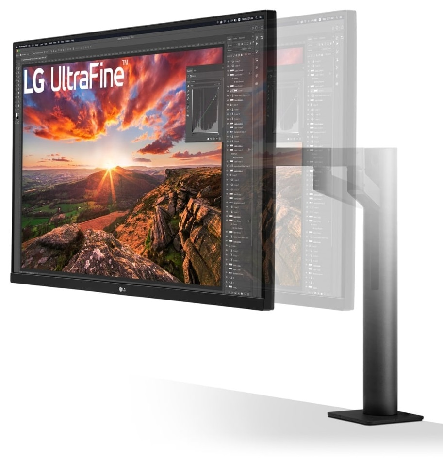 Monitor LG Ultrafine na stojaku, pokazujący zdjęcie gór.