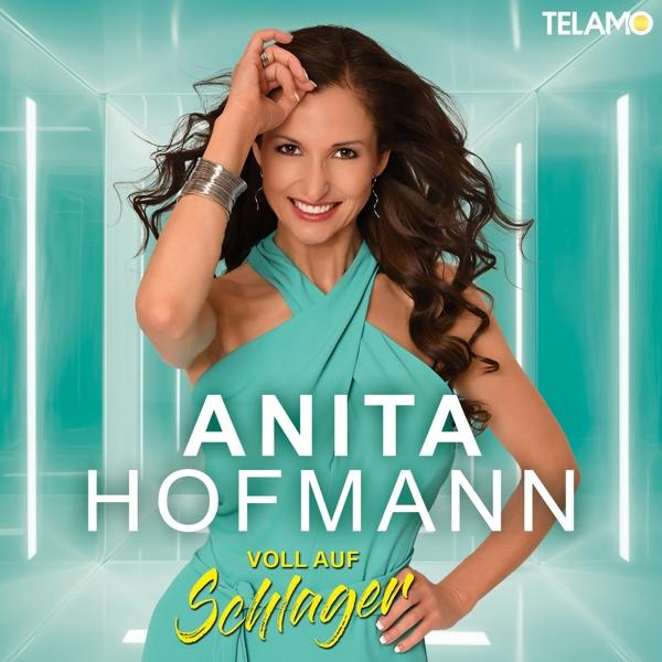 Albumcover: Frau in türkisfarbenem Kleid, lächelnd. Text: 'ANITA HOFMANN', 'VOLL AUF Schlager' und 'TELAMO'.