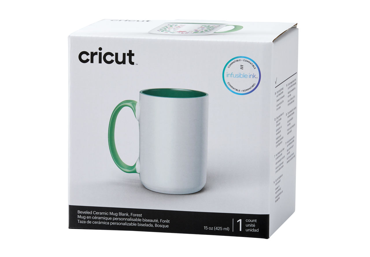 Weißer Cricut-Becher mit grünem Griff und Innenraum, in einer weißen Box mit Cricut-Logo.