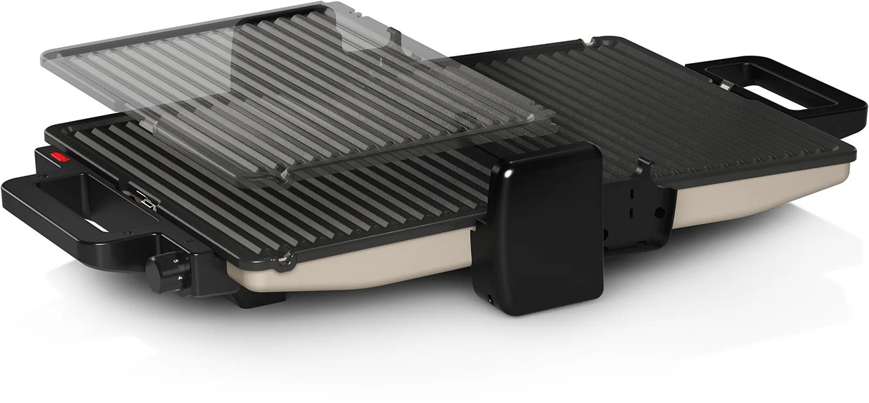 Egy nyitott grill átlátszó tetővel, amely a grillrácsokat és a fekete alapot mutatja.