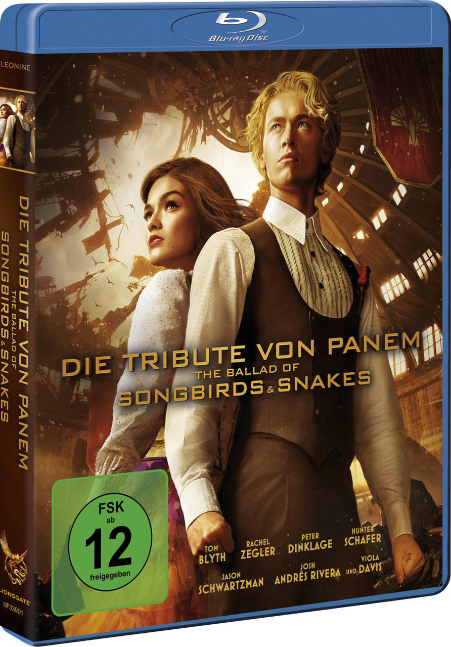 Filmcover von Die Tribute von Panem. Ein Mann und eine Frau stehen zusammen, mit Titel und Schauspielernamen.
