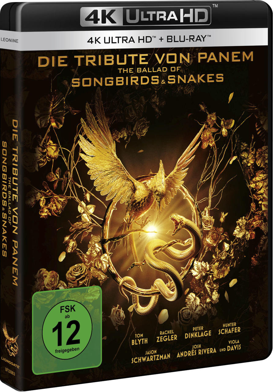 Filmcover mit goldenem Vogel und Schlange, Titel 'Die Tribute von Panem', Schwarz und Gold.