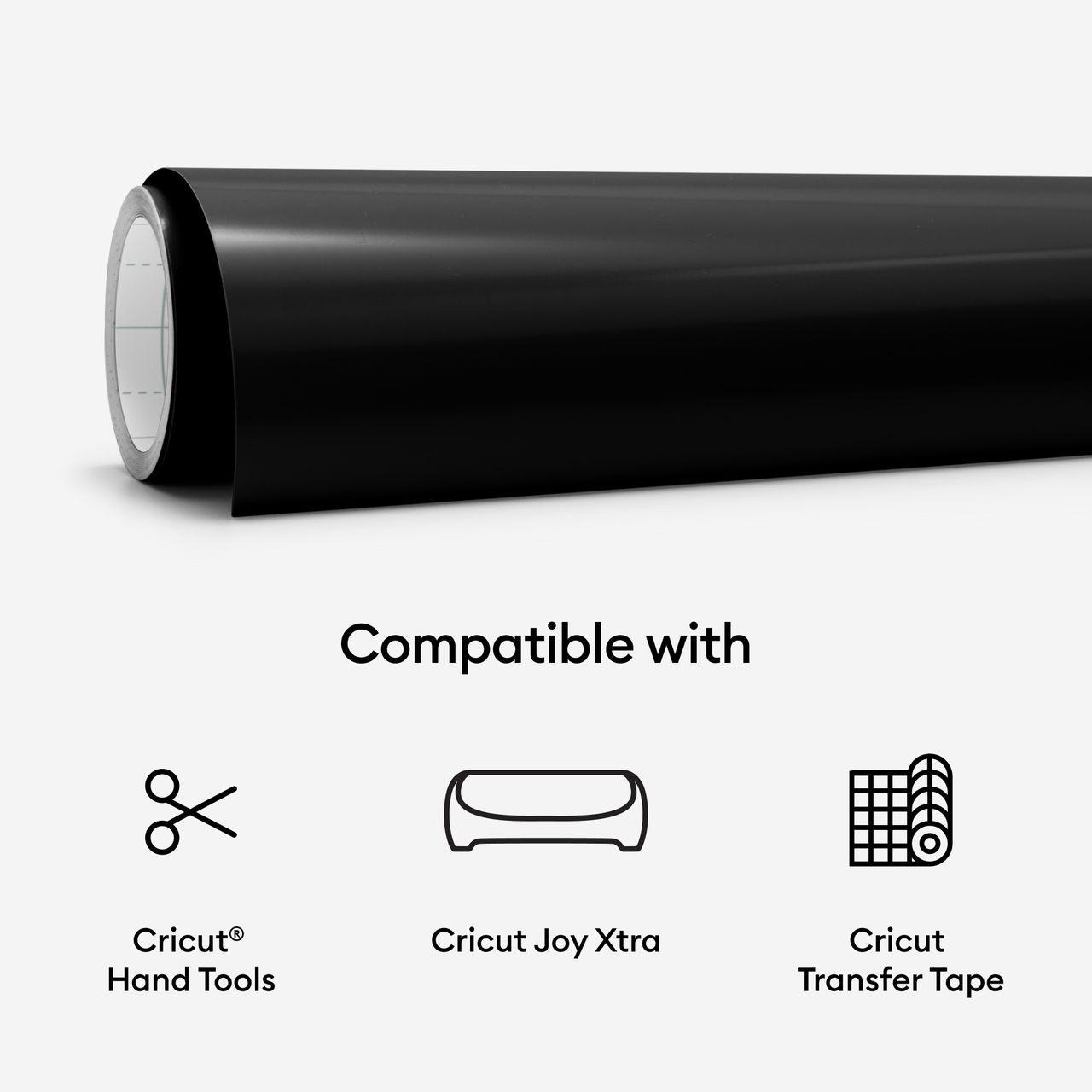 Schwarze Vinylrolle mit weißem Kern und Symbole für Cricut-Handwerkzeuge, Joy Xtra und Transferband.