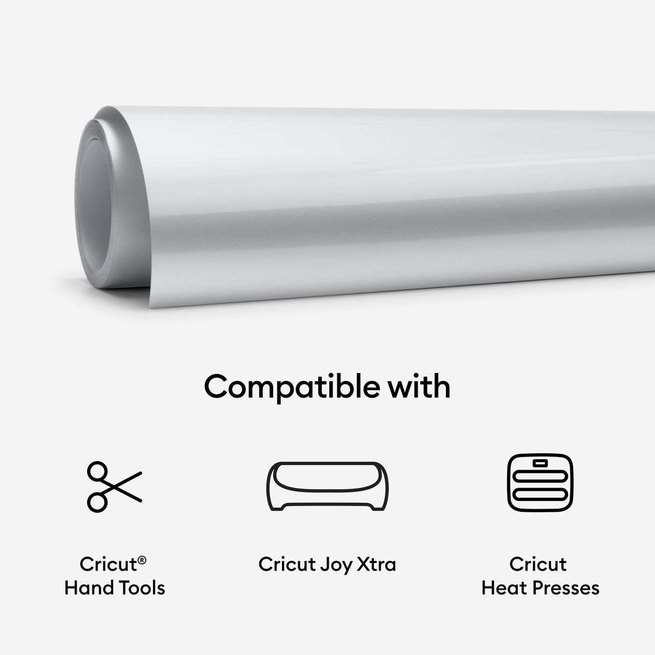 Eine Rolle silbernes Vinyl mit Symbolen: Schere, Cricut Joy Xtra und Cricut Heat Presses.