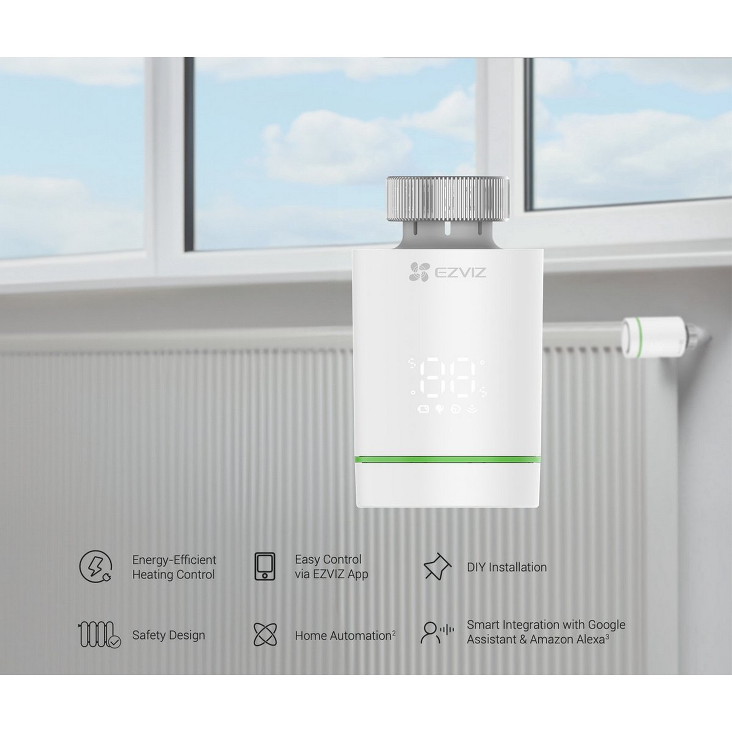 Thermostat intelligent blanc sur radiateur. Affiche la température. Mur et fenêtre blancs en arrière-plan.