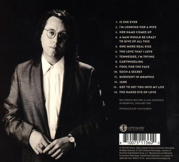 Albumcover mit einem Mann mit Brille und Anzug, mit einer Liste von Liedern.