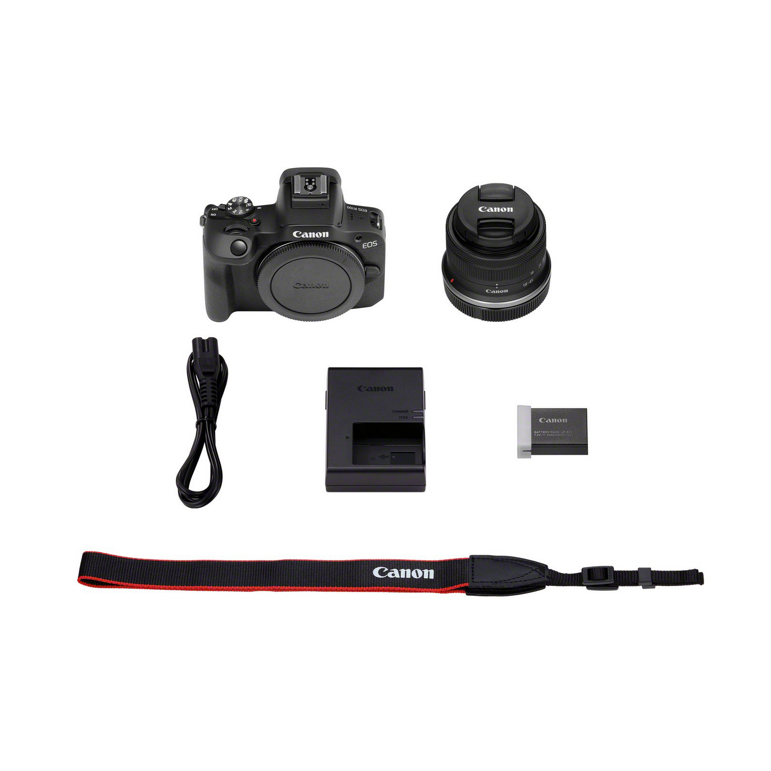 A camera setup with the camera, a lens, charger, battery, strap, and other accessories on a white background.