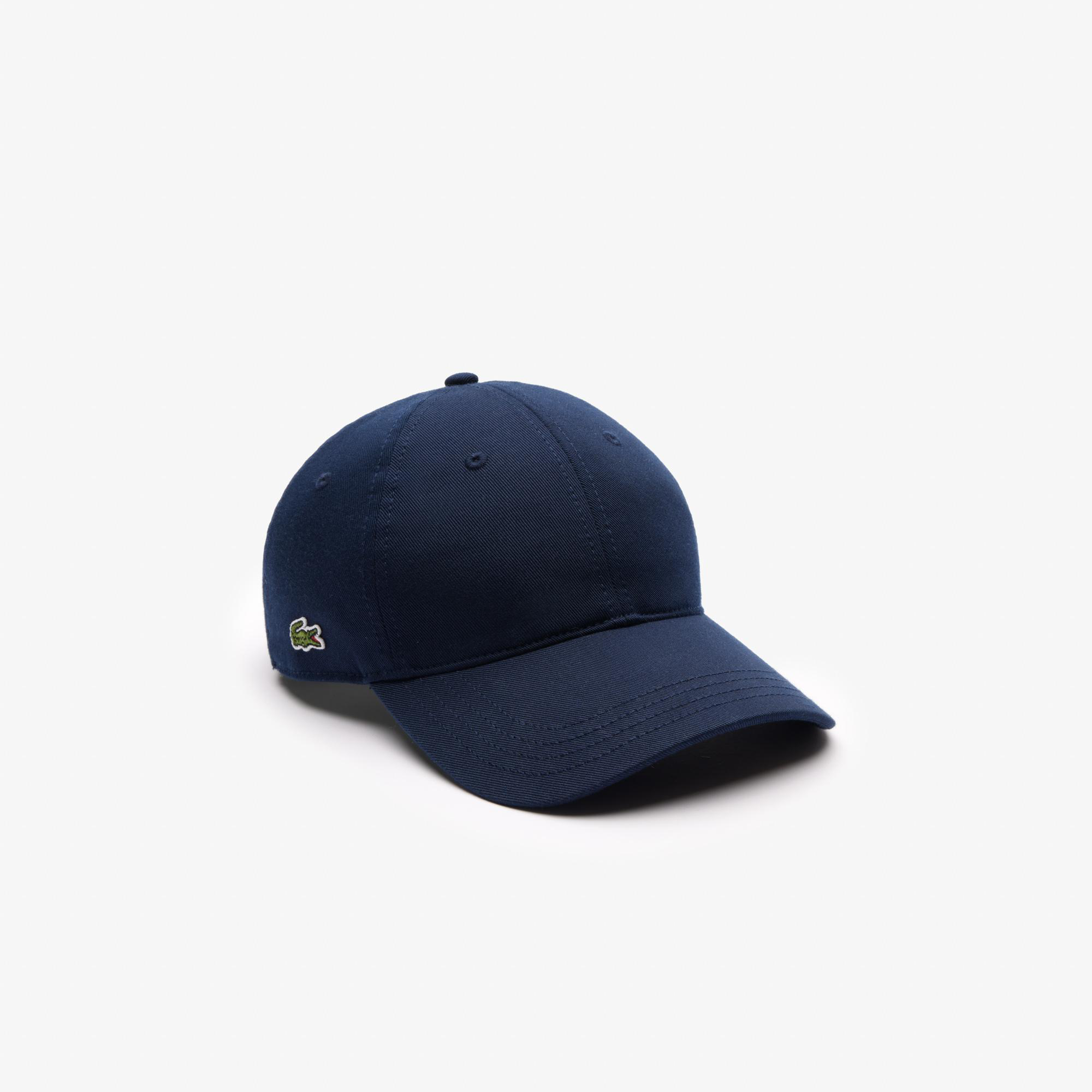 Marineblaue Baseballkappe mit kleinem grünem Krokodil-Logo an der Seite.