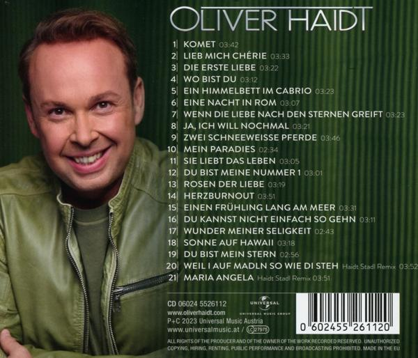 CD-Hülle Rückseite mit Titelliste, Foto eines Mannes in grüner Jacke lächelnd.