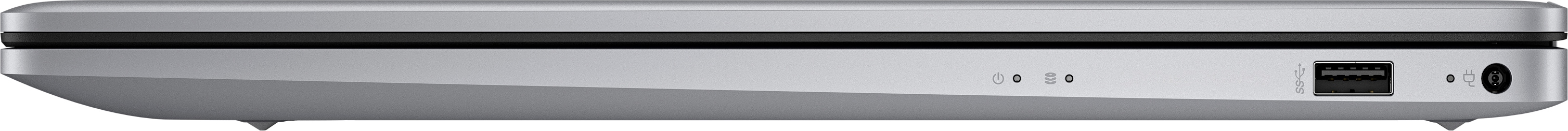 Nahaufnahme der Seite eines silbernen Laptops. Anschlüsse und Lichter sind sichtbar.