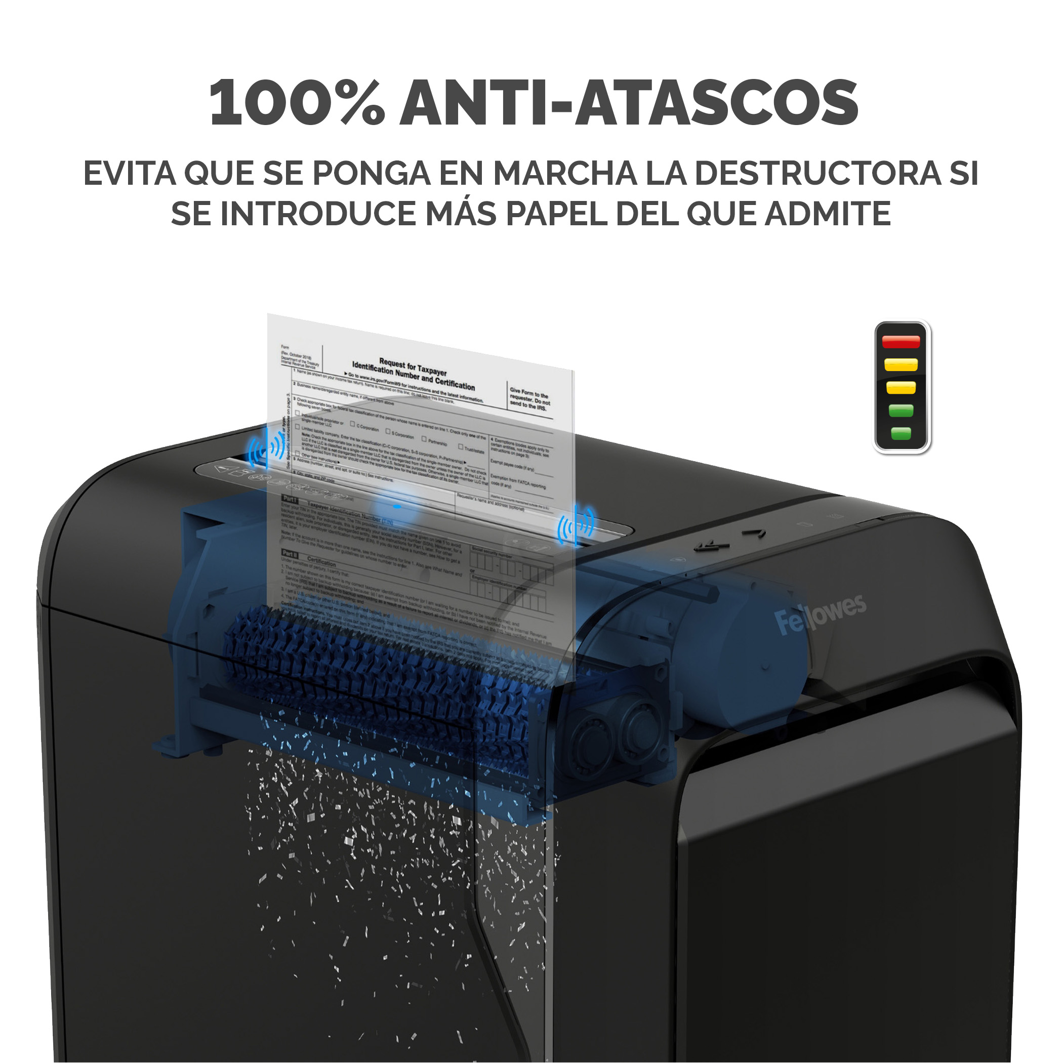 Una destructora de papel está destruyendo papel. El mecanismo interno es visible, texto en español.