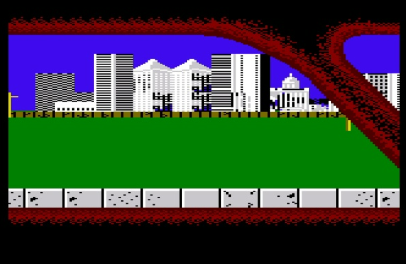 Eine verpixelte Stadtlandschaft mit einem grünen Feld im Vordergrund und einem roten Rand.
