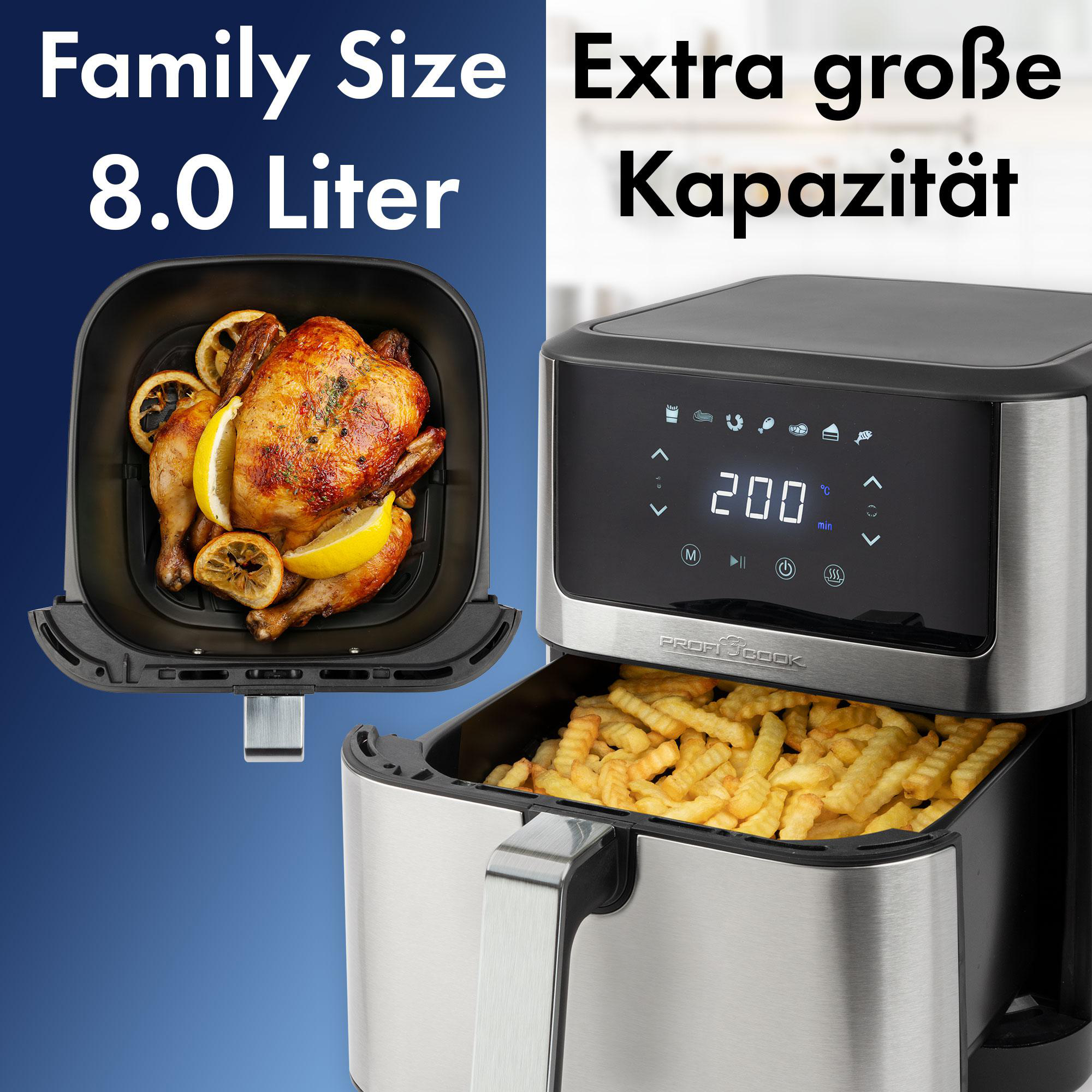 Heißluftfritteuse mit gekochtem Hähnchen und Pommes. Edelstahl und Schwarz. Weißer Hintergrund.