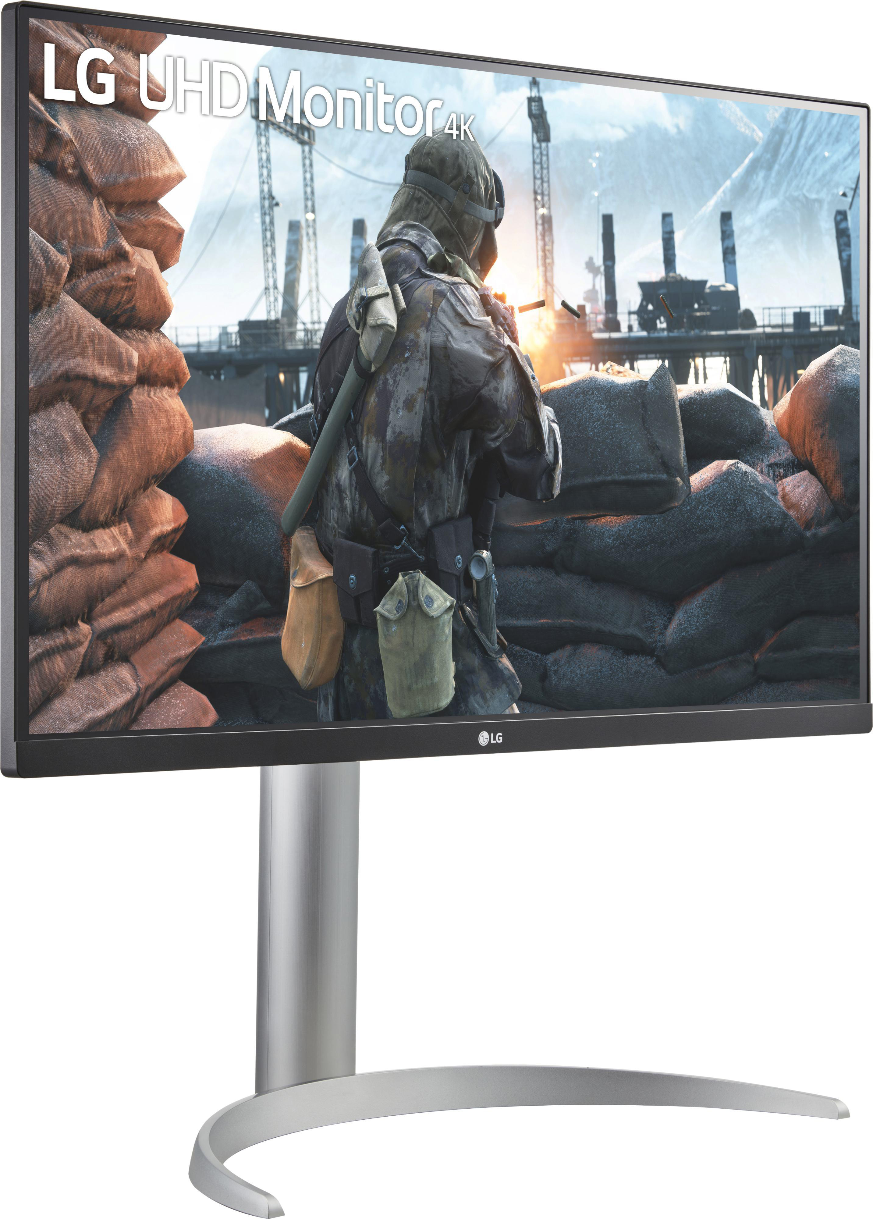 Ein LG UHD 4K Monitor, der eine Kampfszene aus einem Videospiel zeigt, silberner Ständer.