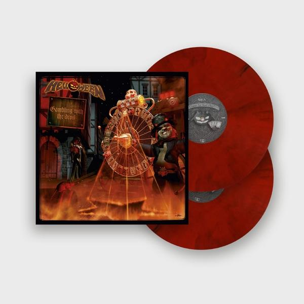 Album borító: 'Gambling with the Devil' piros és fekete bakelit lemezekkel fehér háttér előtt.