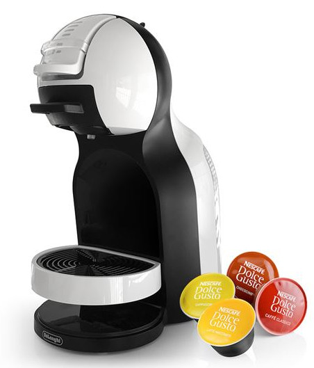 Czarno-biały ekspres do kawy z kapsułkami do kawy obok.