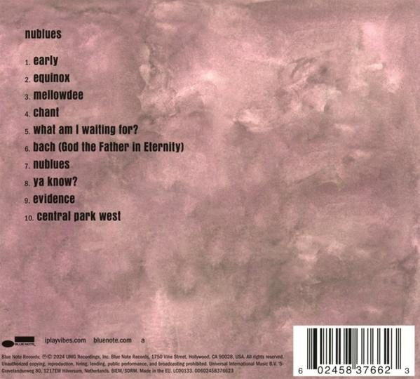 Ein Musikalbum-Cover mit lila Hintergrund und Text.
