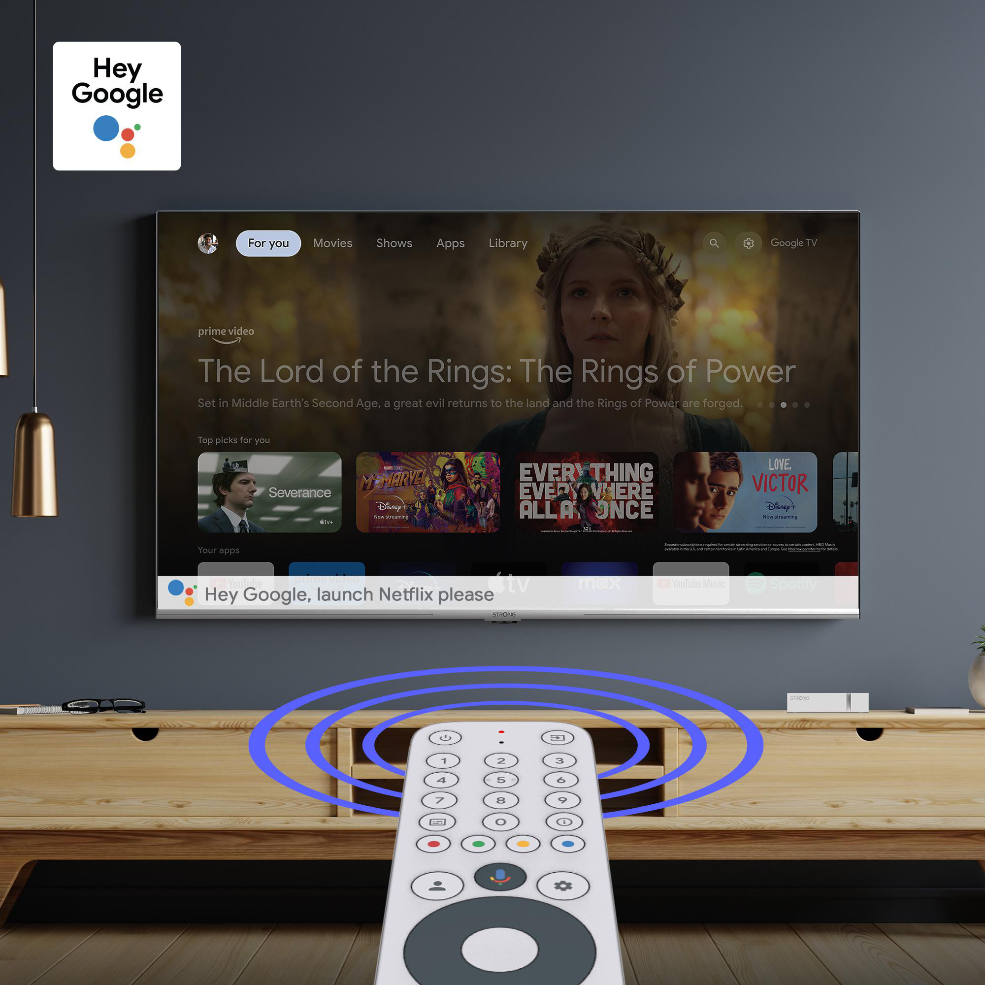 Ein Fernsehbildschirm mit Streaming-Inhalten und einer Fernbedienung darunter.