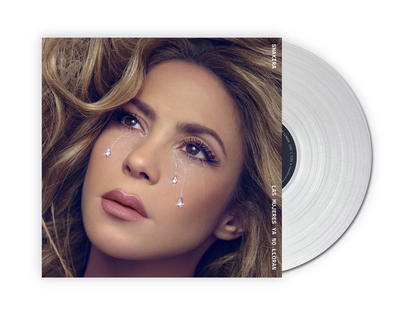 Albumcover von Shakira mit Tränen, neben einer silbernen Schallplatte.