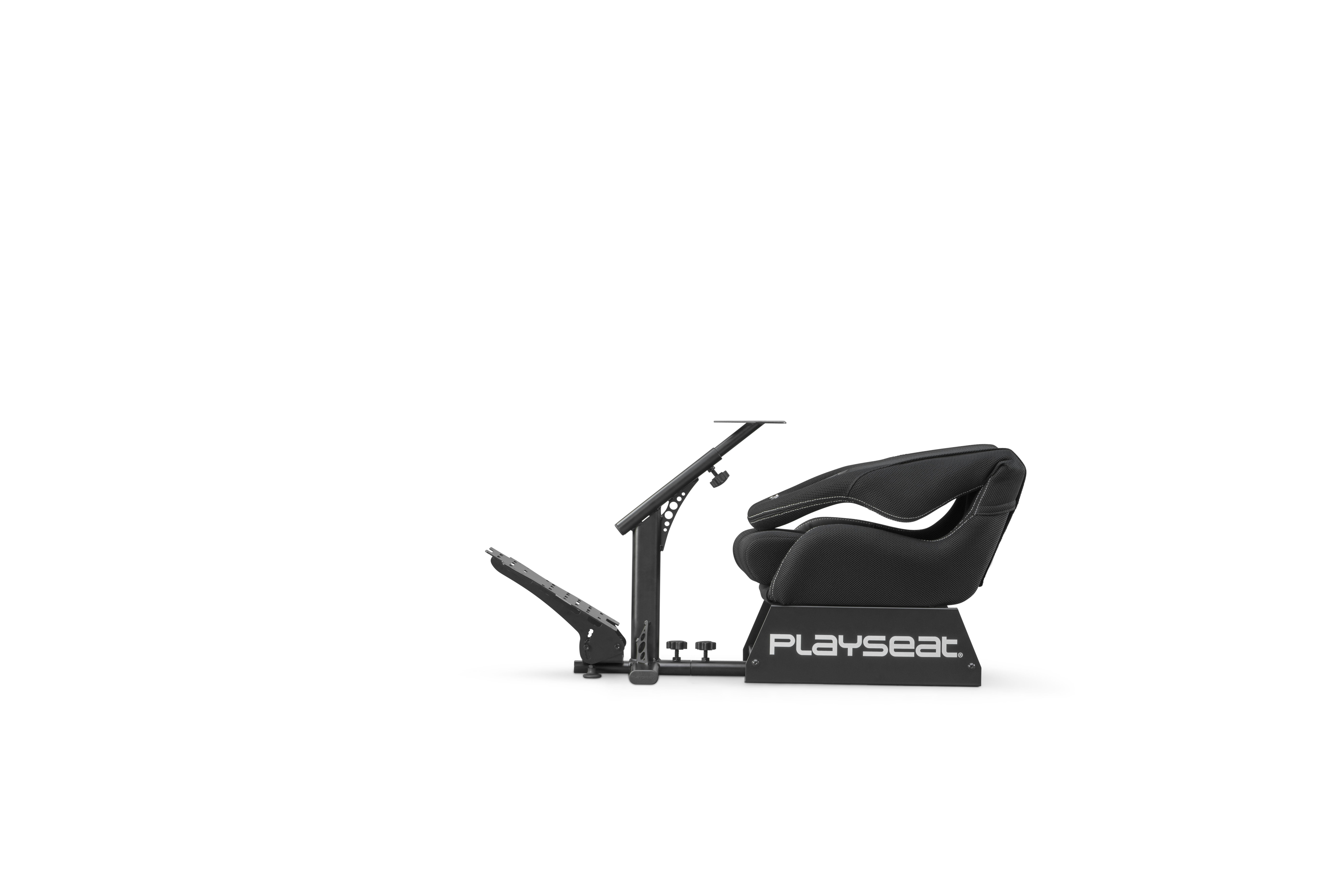 A black and silver racing simulator chair with a footrest and steering wheel mount.