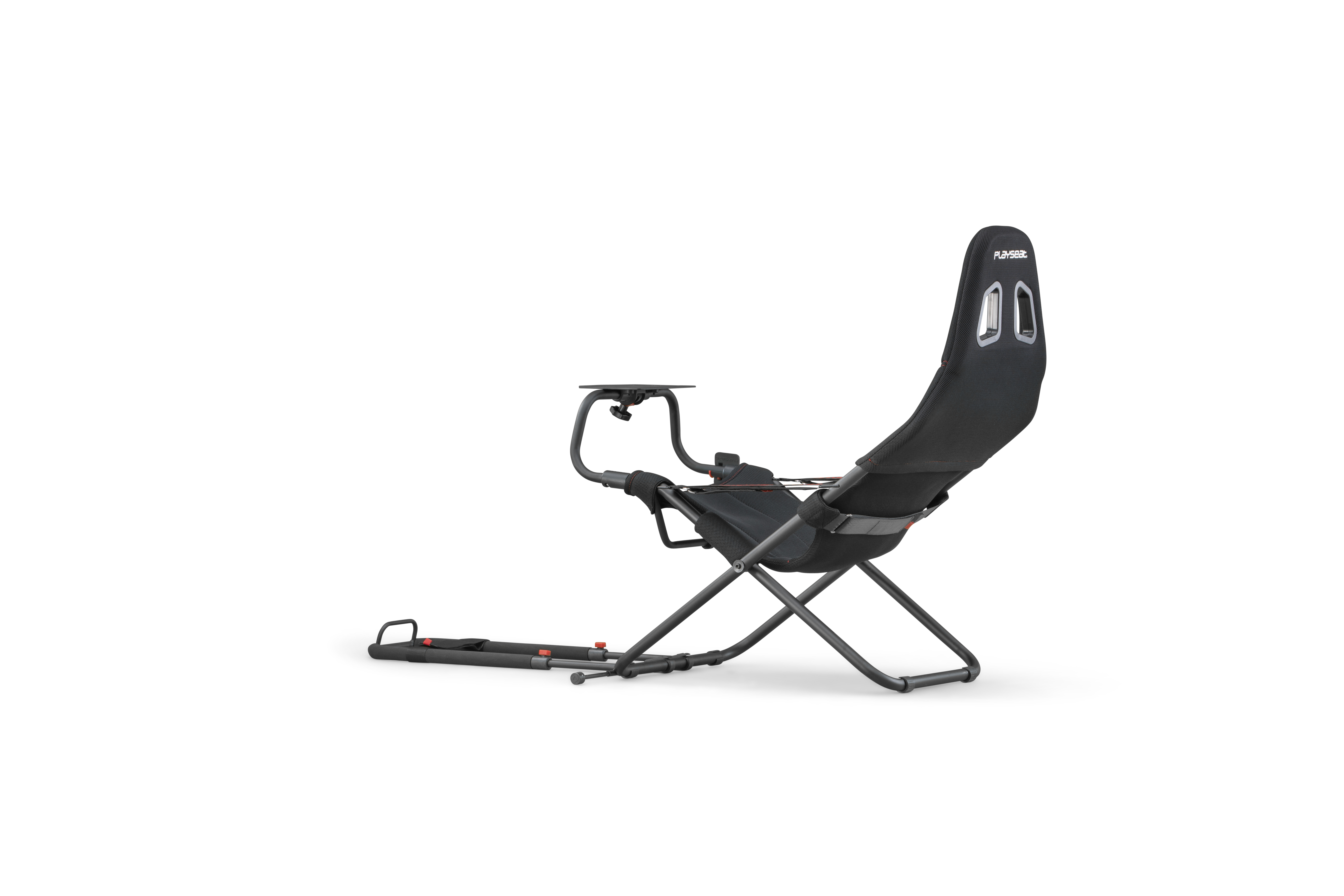 A black Playseat gaming chair, designed for simulated racing games.