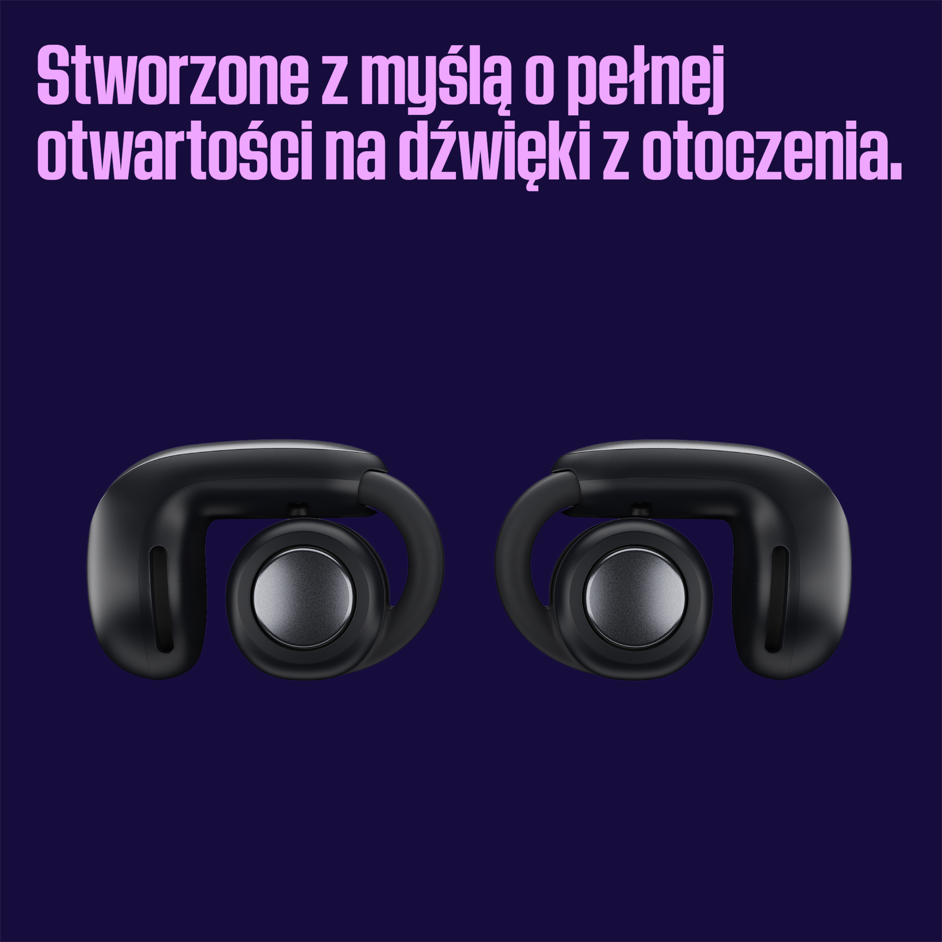 Dwa czarne bezprzewodowe słuchawki na fioletowym tle. Tekst powyżej mówi: 'Stworzone z pełną otwartością na dźwięki otoczenia'.