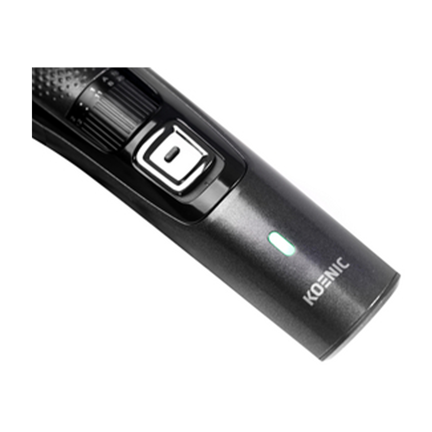 Primo piano di un trimmer elettrico Koenic nero e argento con spia verde.
