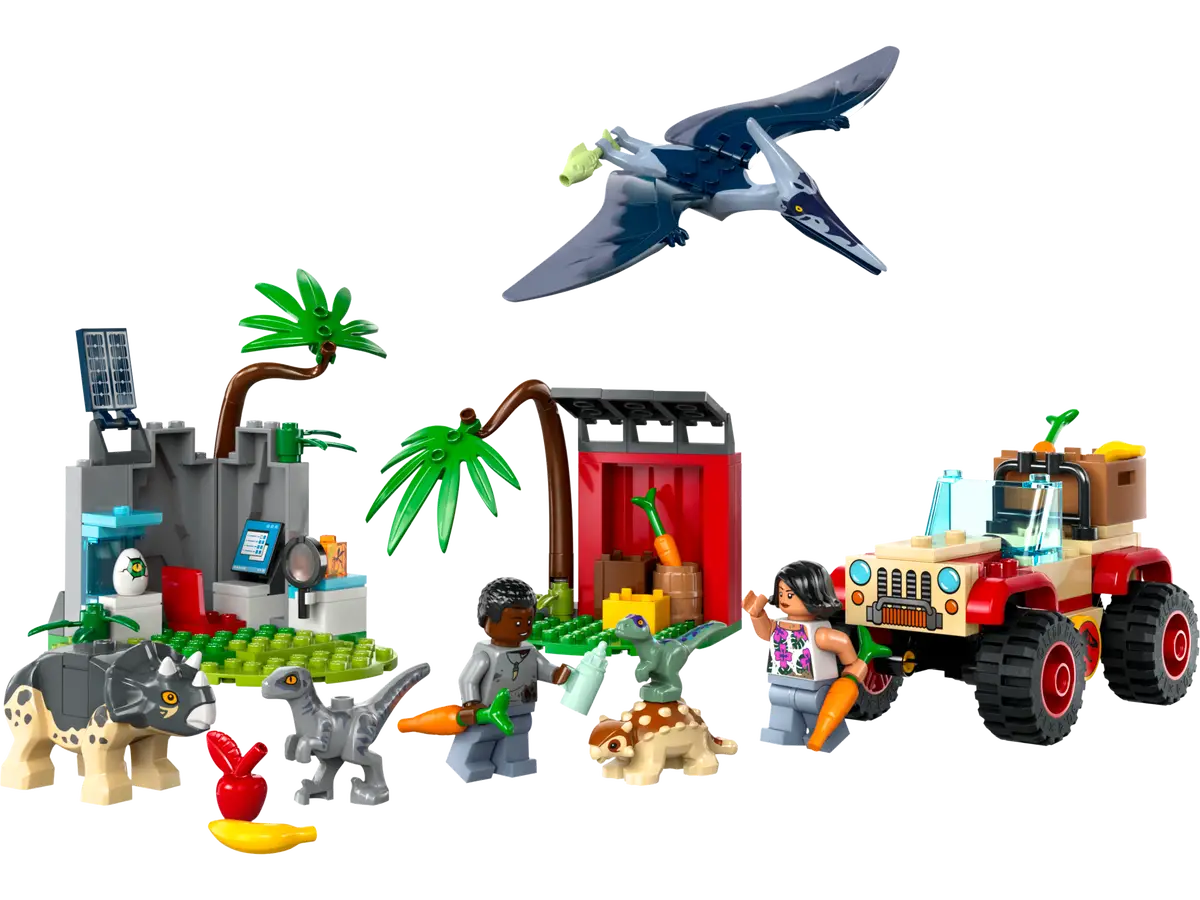 Scena Lego Jurassic World z Jeepem, dinozaurami i postaciami. Pterodaktyl leci nad głową.