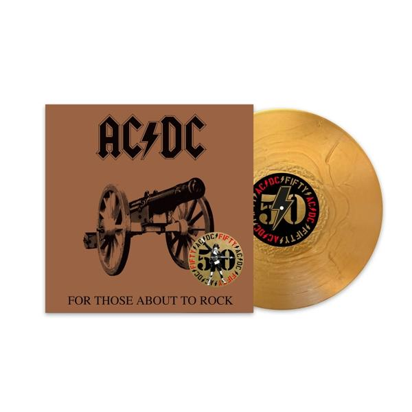 Goldene Schallplatte mit braunem Cover, AC/DC und Kanone.