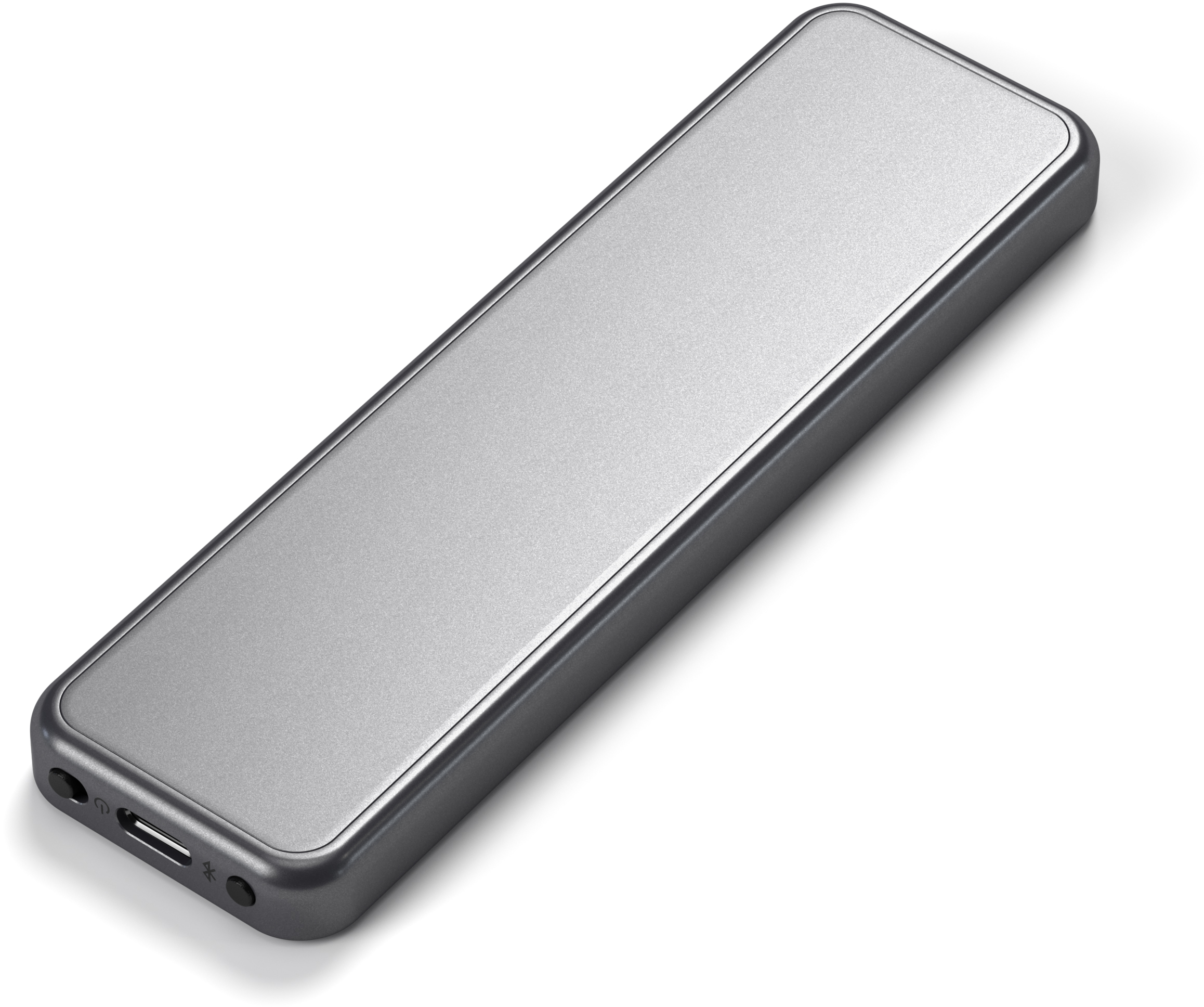 Karcsú, téglalap alakú, ezüst színű készülék lekerekített élekkel. Van rajta egy USB-port és két lyuk.