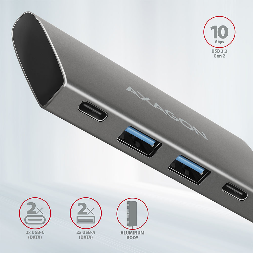Egy szürke Axagon USB hub USB-C és USB-A portokkal, alumínium testtel.