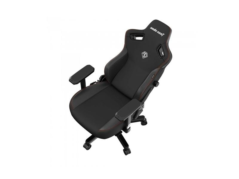 Sedia da gaming nera e grigia dall'alto. Ha braccioli e poggiatesta. Sfondo bianco.