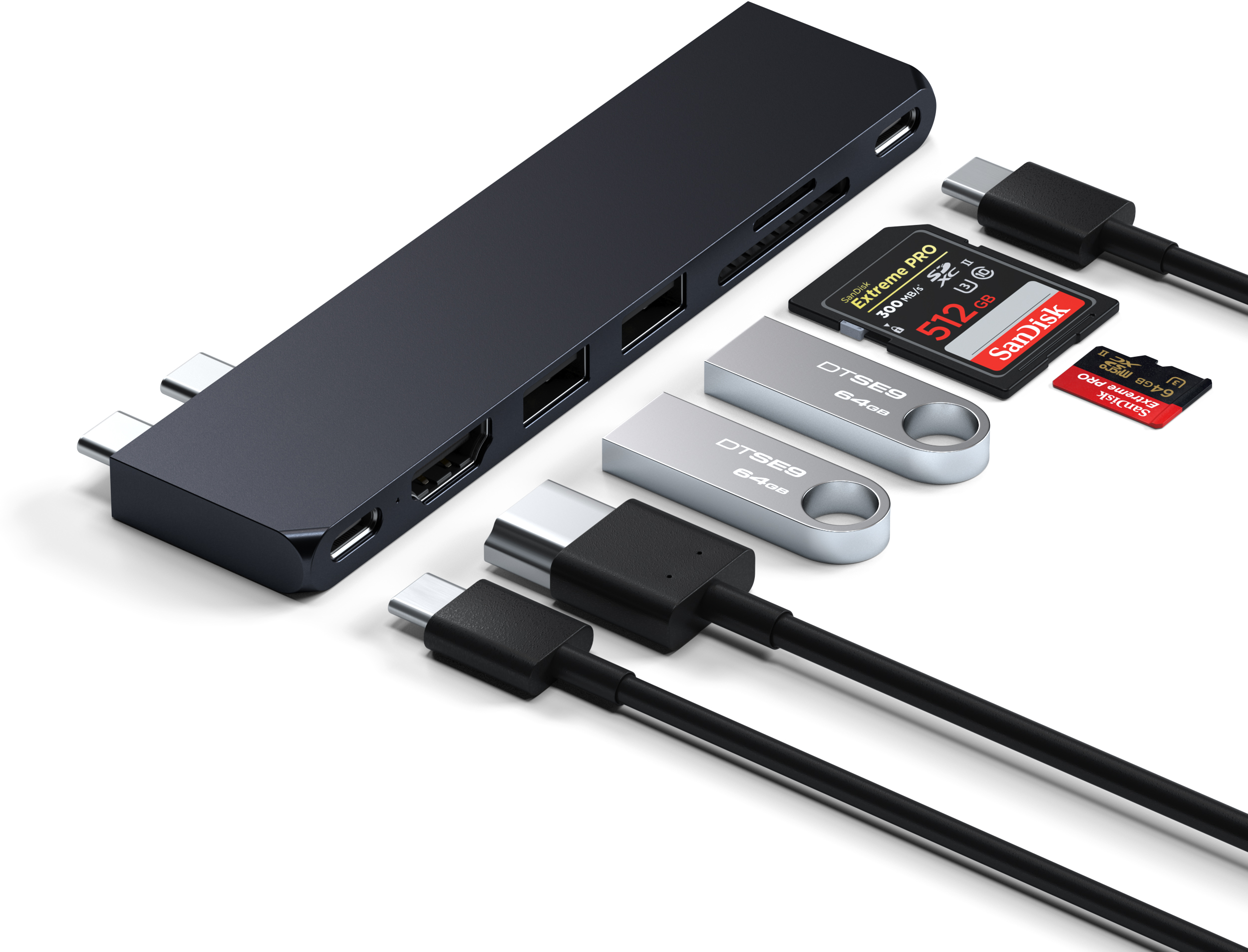 Egy fekete USB-C hub különböző csatlakozókkal és kiegészítőkkel, beleértve az SD kártyákat és USB meghajtókat.