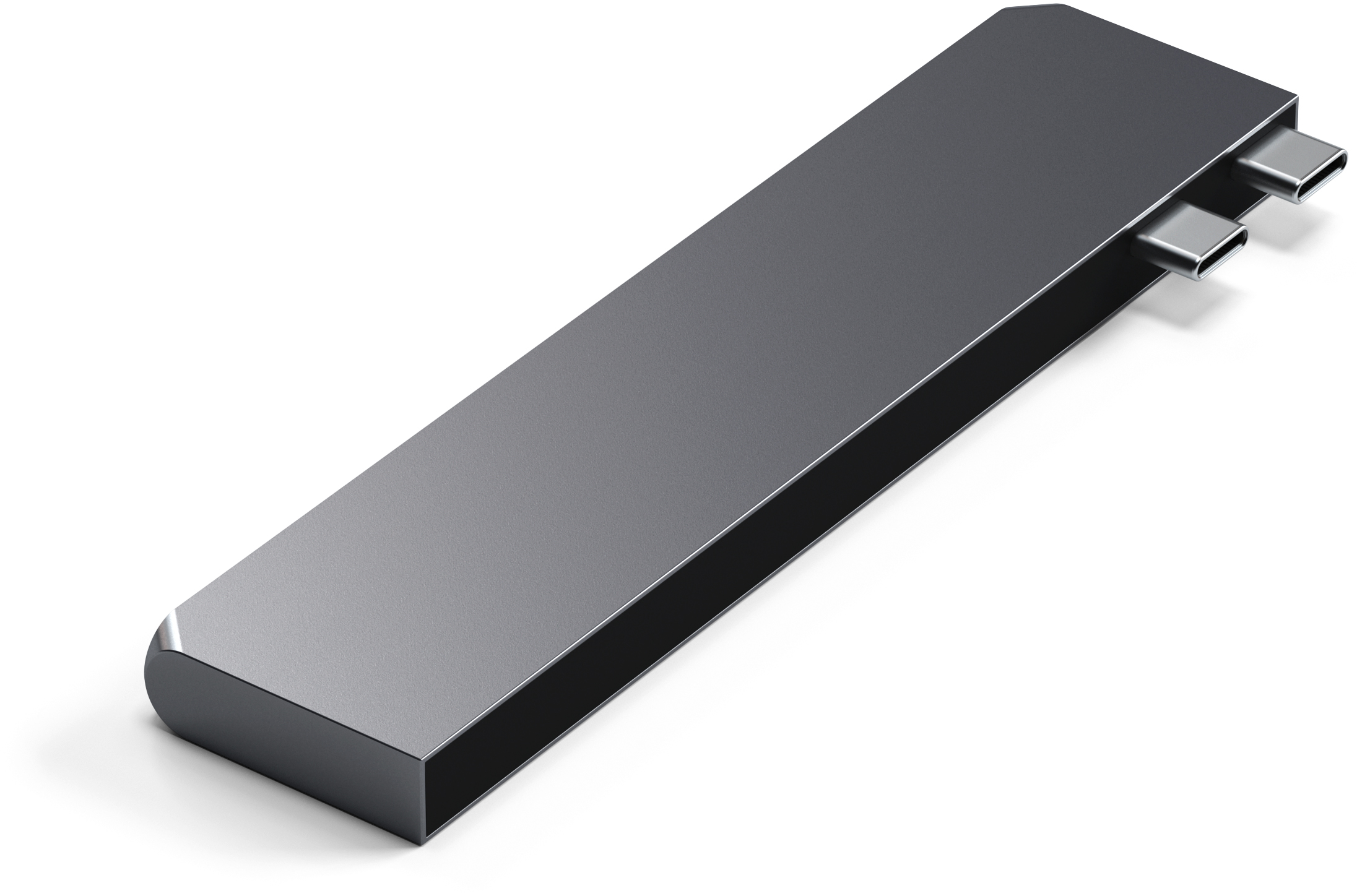 Fekete téglalap USB-C portokkal a végén. A készülék fehér felületen fekszik.