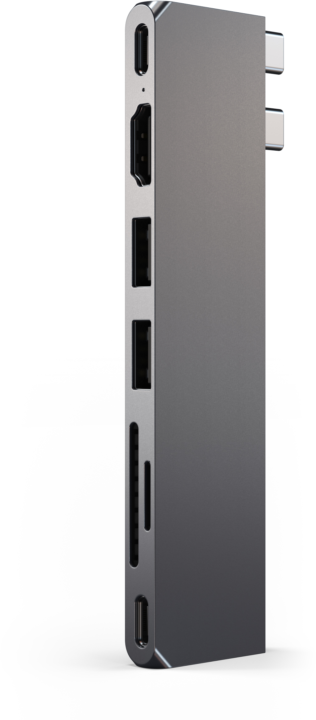 Ezüst USB hub sok porttal. Fehér felületen van. A hub HDMI, USB és SD kártya portokkal rendelkezik.