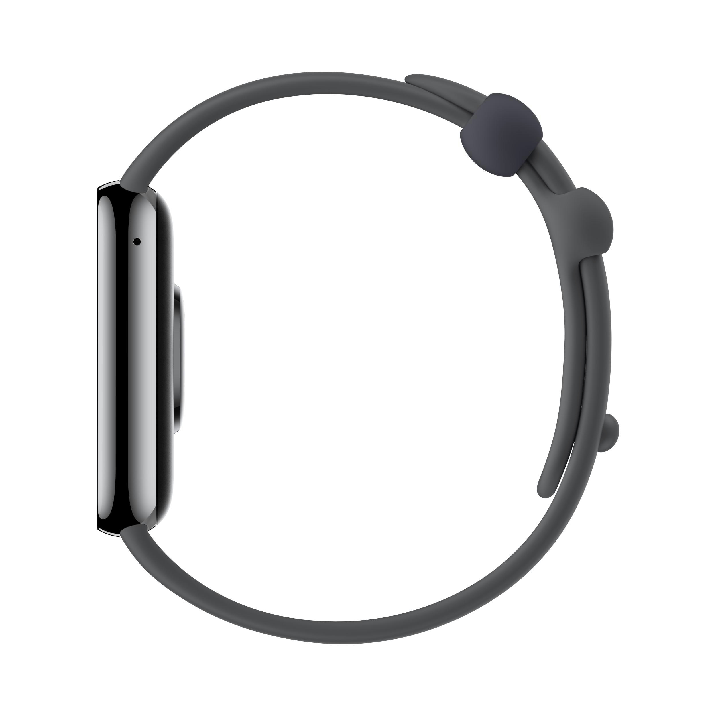 Graue Smartwatch, Seitenansicht, mit Armband und einfachem Design.