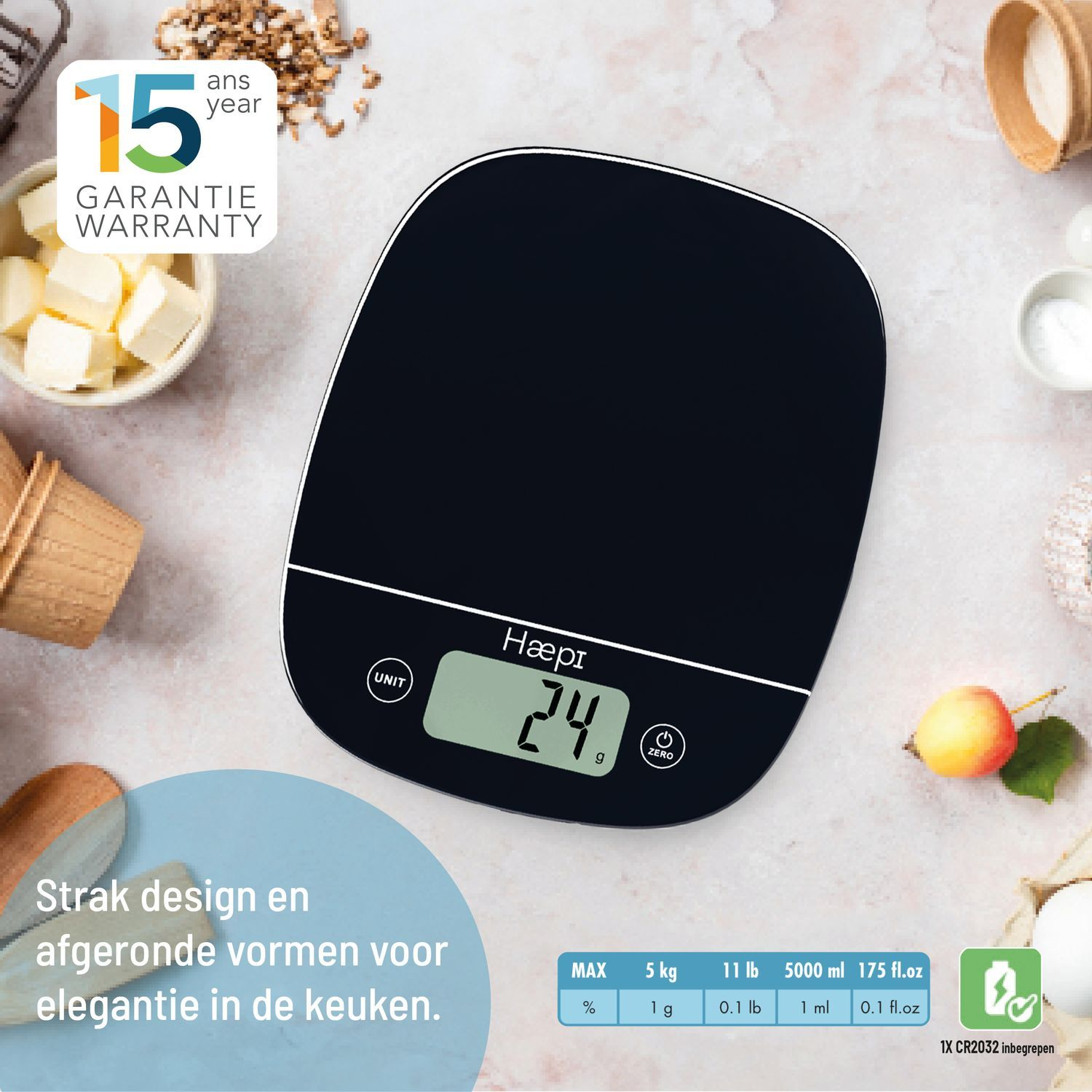Black digital kitchen scale with a black surface and 15-year warranty.