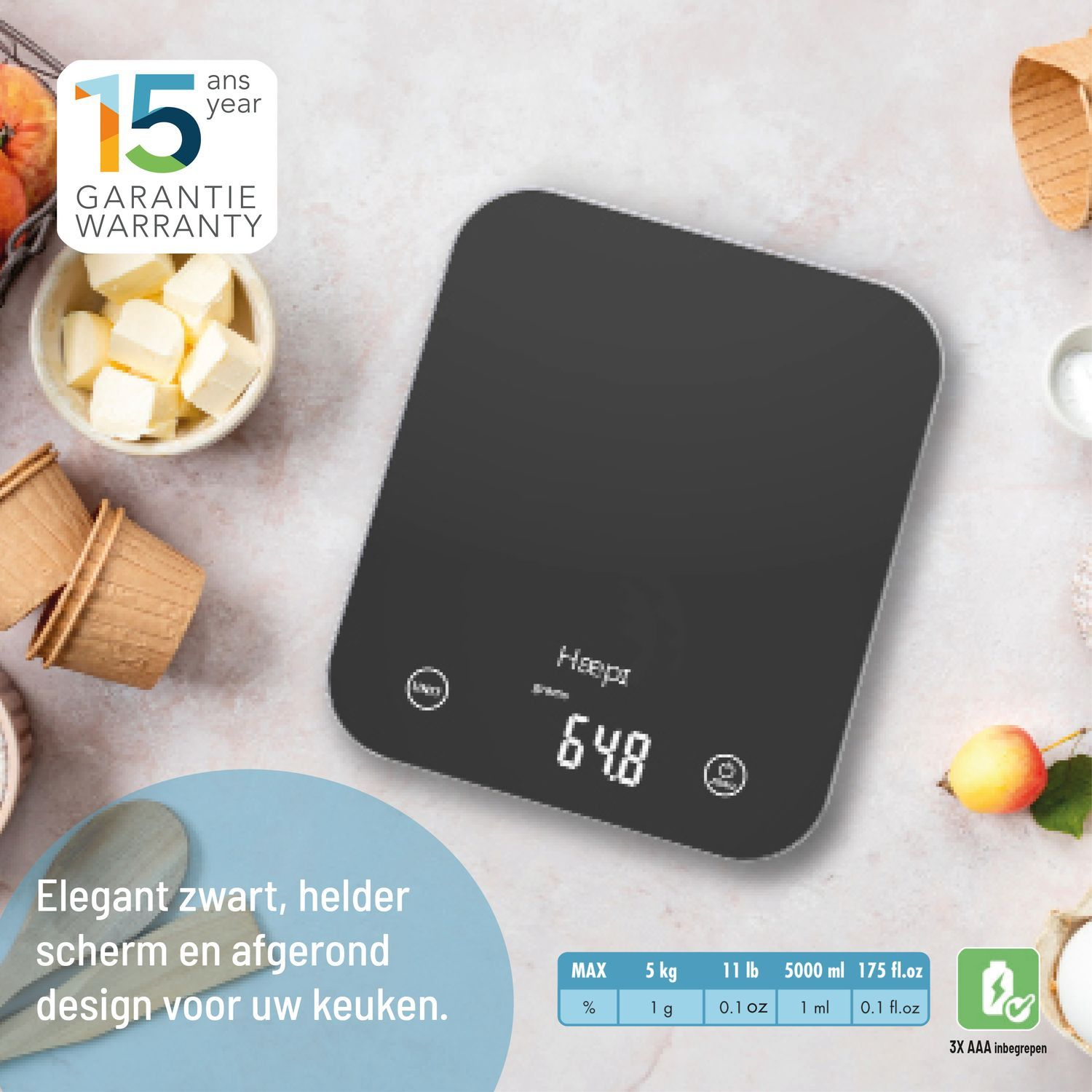Black digital kitchen scale with display showing 64.8, surrounded by ingredients and a 15-year warranty.