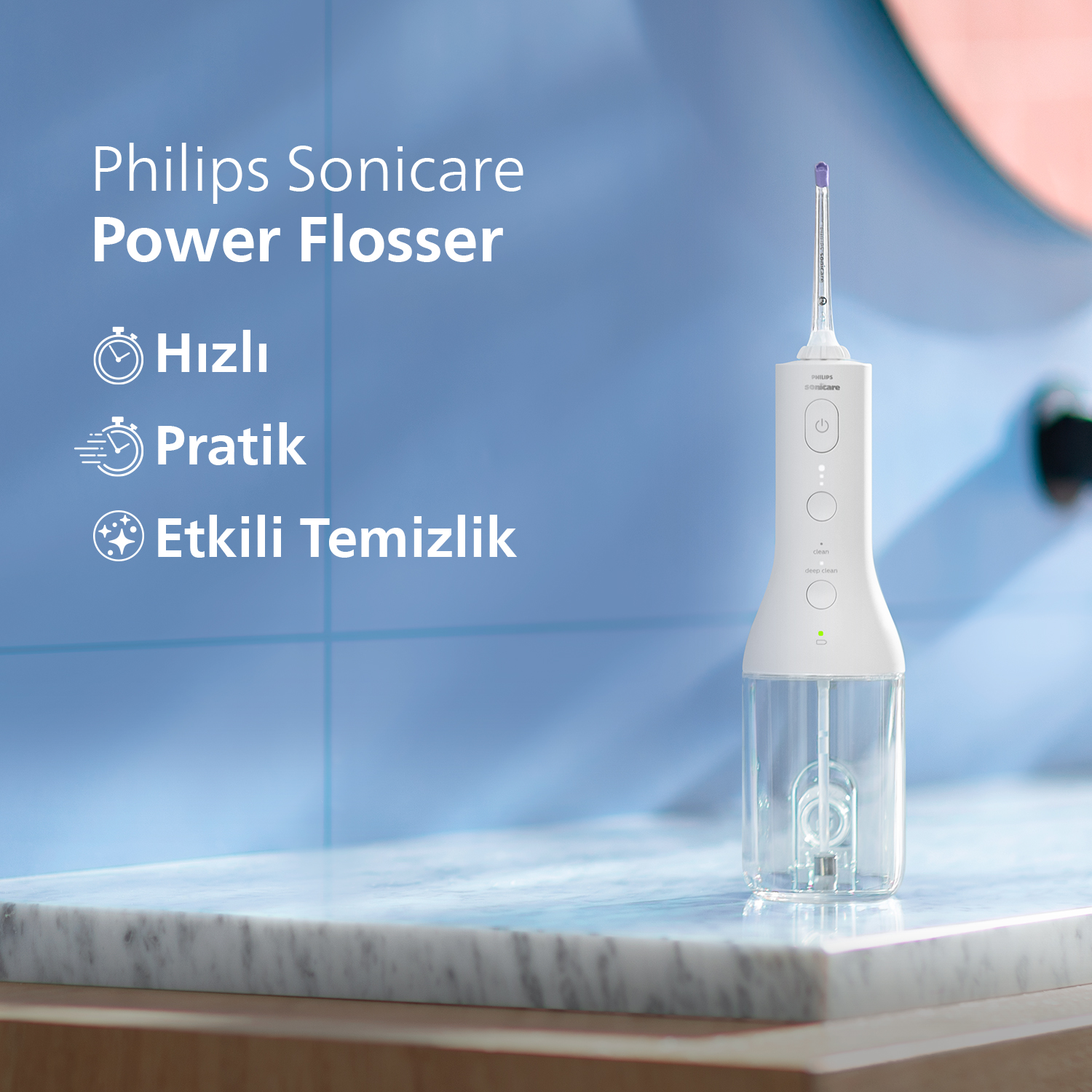 Mermer bir yüzeyde Philips Sonicare Power Flosser. Metin vurguları: hızlı, pratik, etkili temizlik.