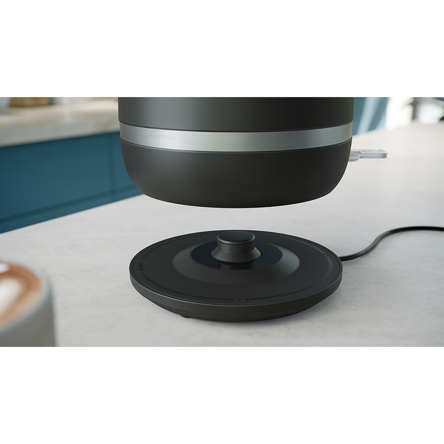 Electric kettle on a base, close-up shot.